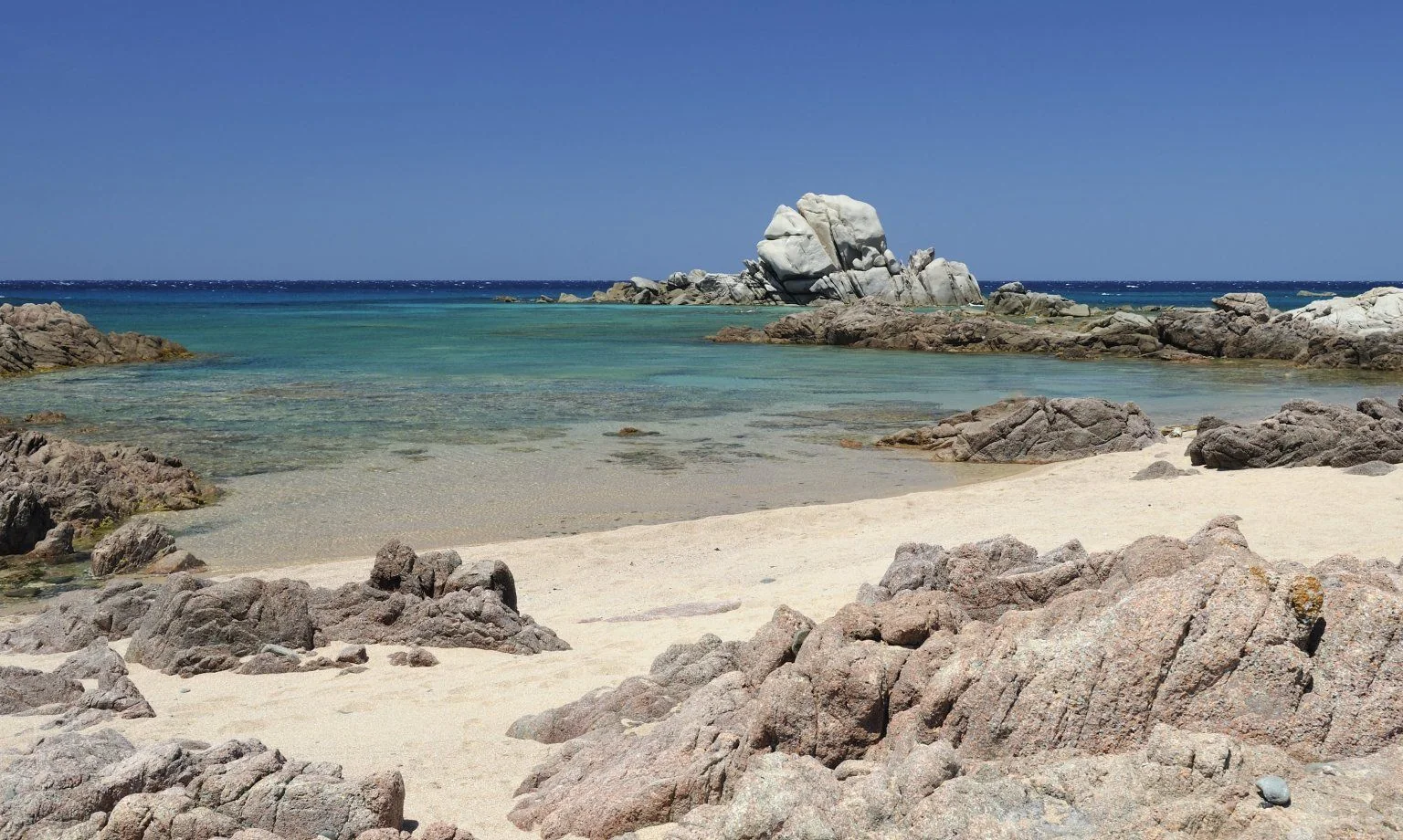 Granite rocks and clear water at a nearby cove